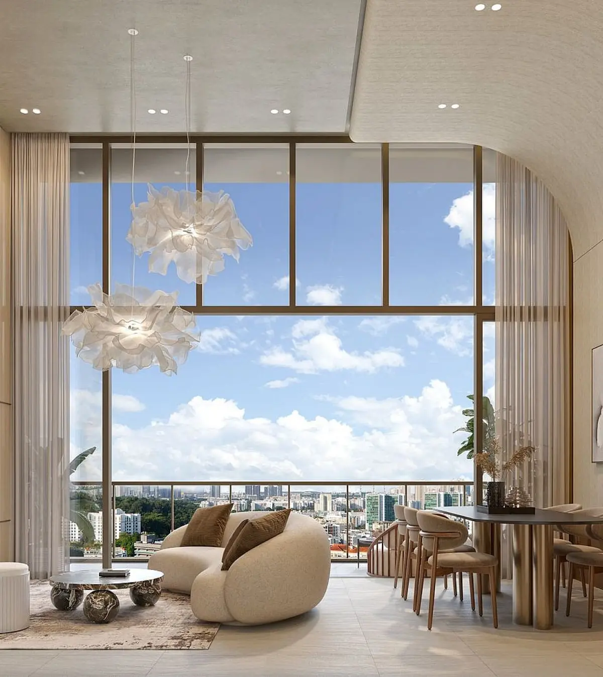 4 Bedroom Unit Interior: A minimalist living and dining area with beige walls, a dining table, and a cozy seating arrangement, facing a large window with scenic outdoor views.
