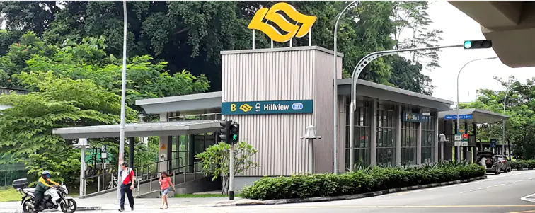 Hillview MRT Station - Hillview MRT station entrance nearby with people in the vicinity, and the station signage visible at the top.